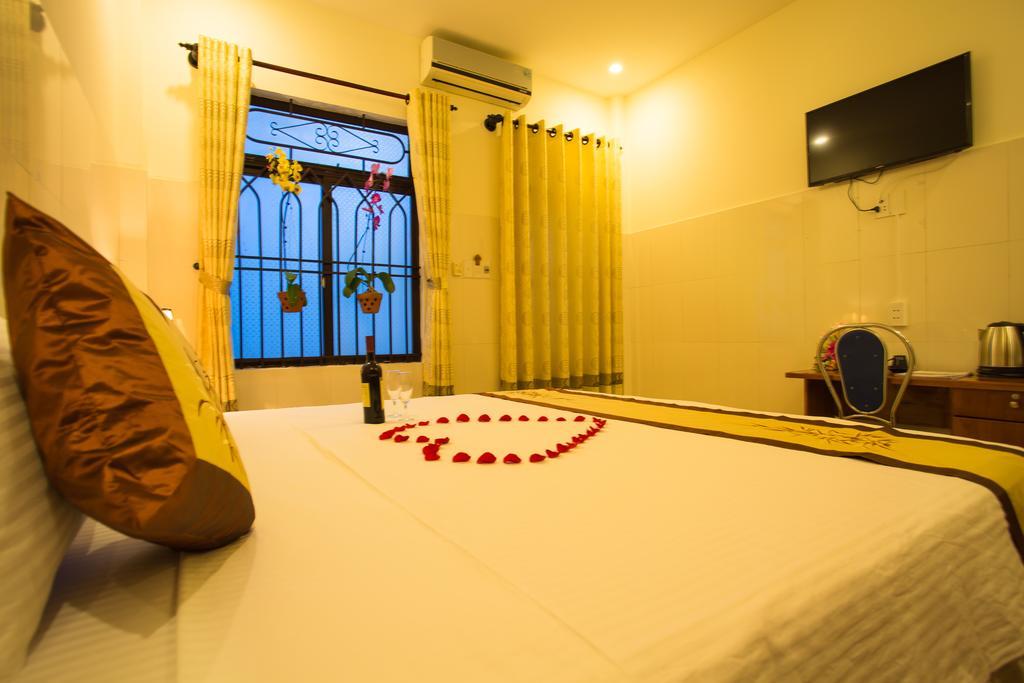 Holy Land Homestay Хойан Экстерьер фото