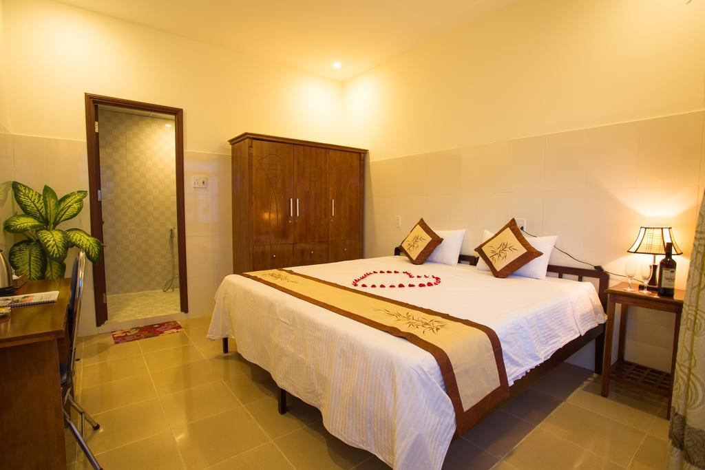 Holy Land Homestay Хойан Экстерьер фото