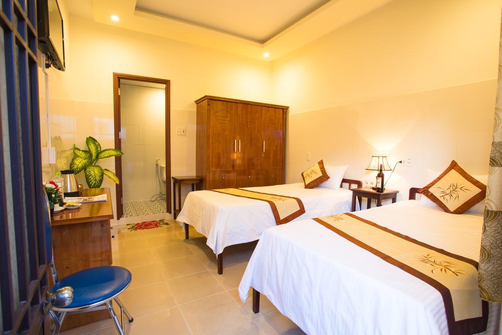 Holy Land Homestay Хойан Экстерьер фото